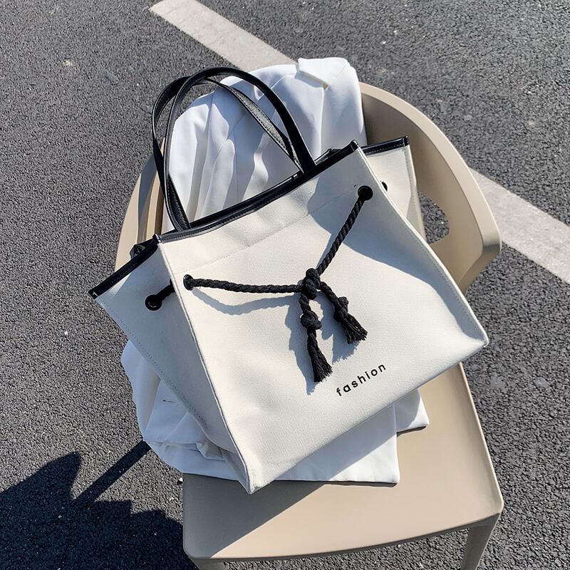 バッグレディースバッグ2020夏ワイルドカジュアルキャンバスショルダーバッグネットレッド大容量トートバッグ潮の新バージョン Tiancai_Wing_Bag4174252