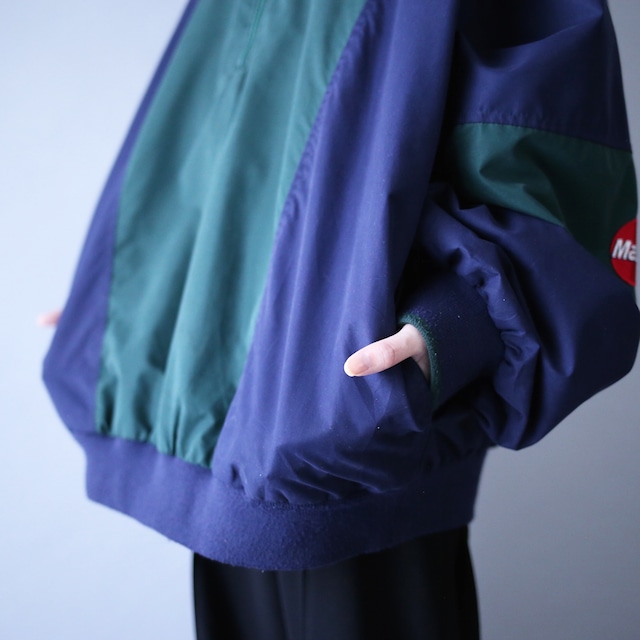 "Master Card" green × navy bi-color switching half-zip pullover