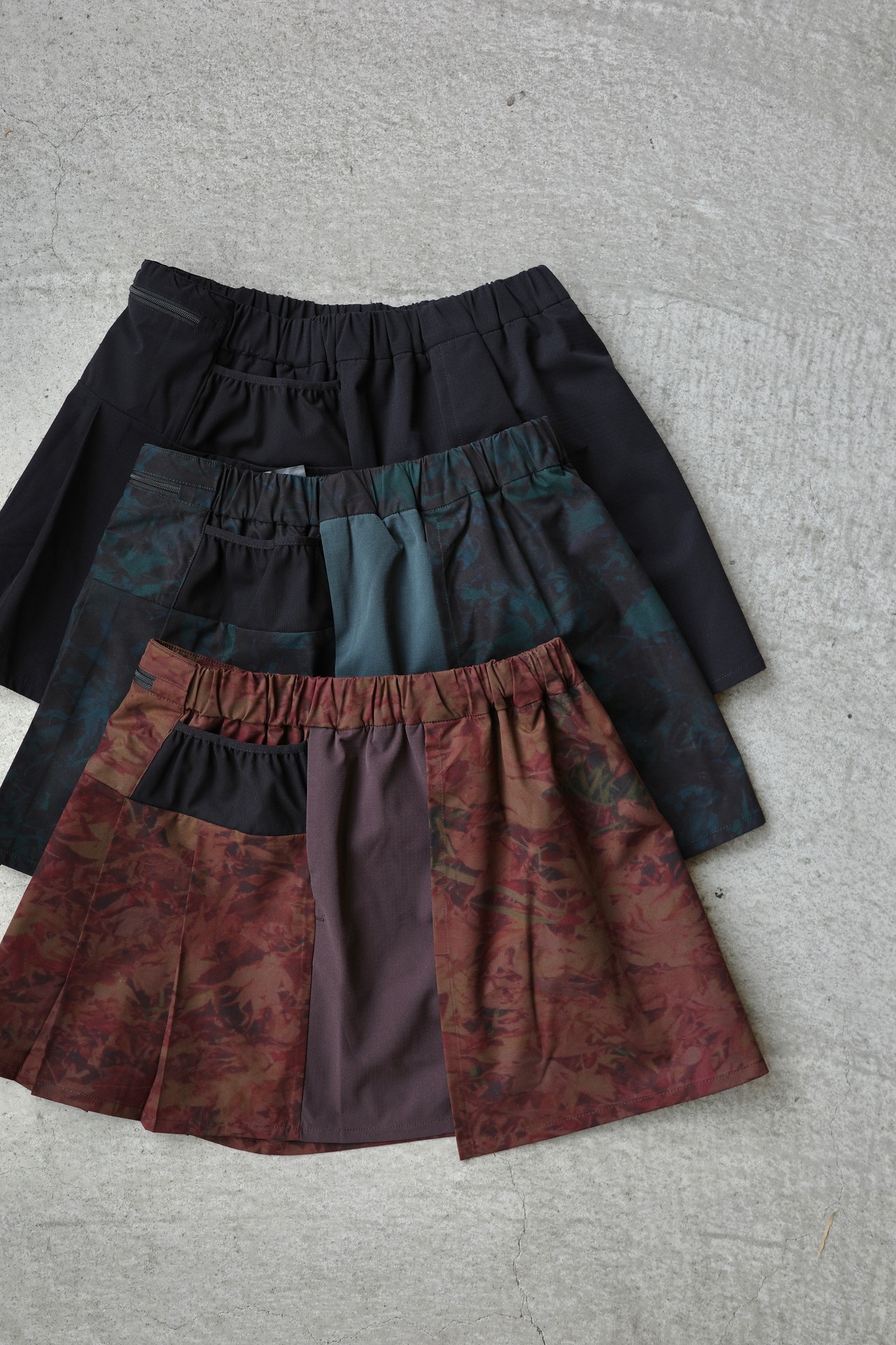 24FW DEADLEAF DOCKING RUN SKIRT