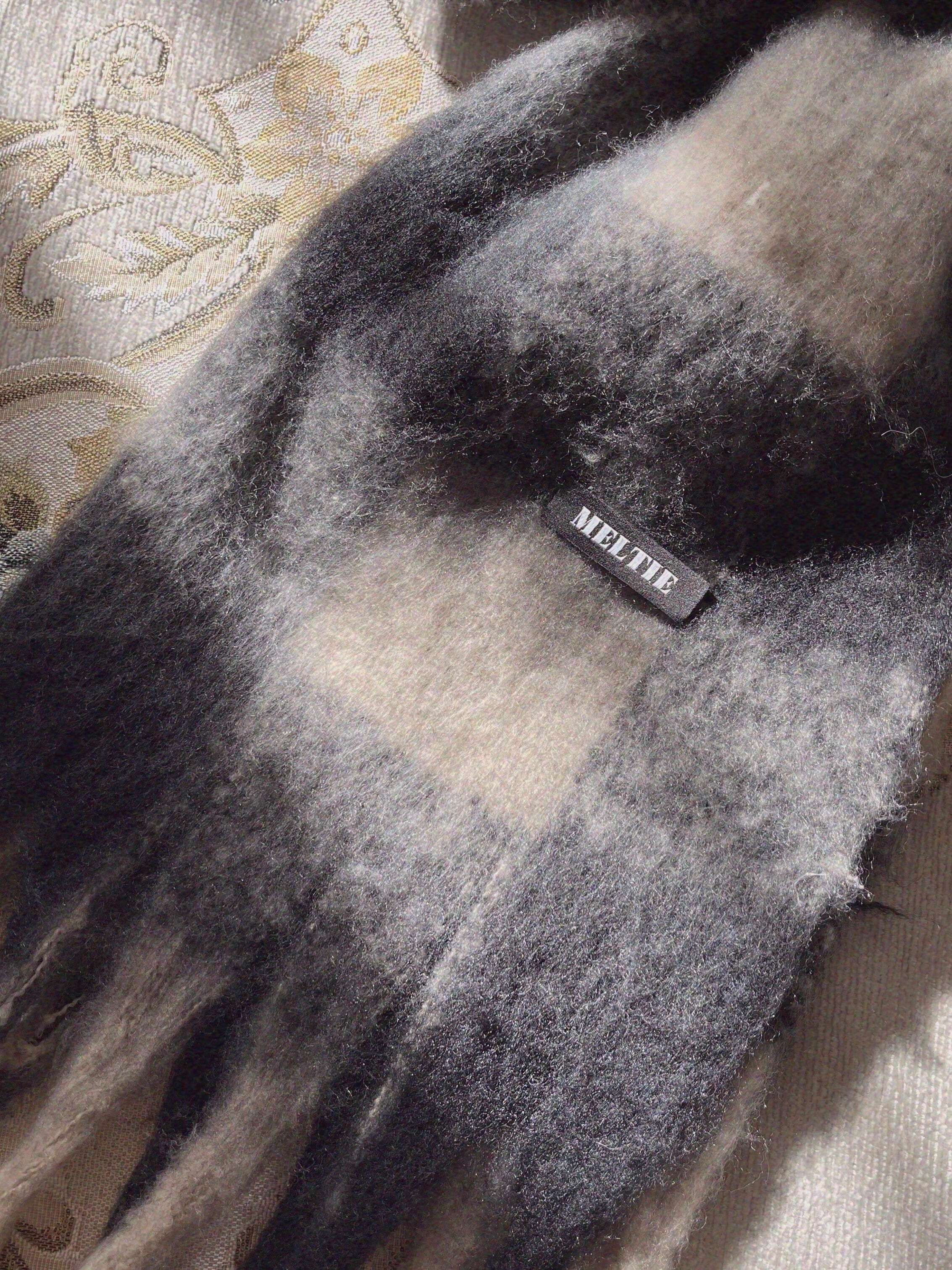 volume check muffler