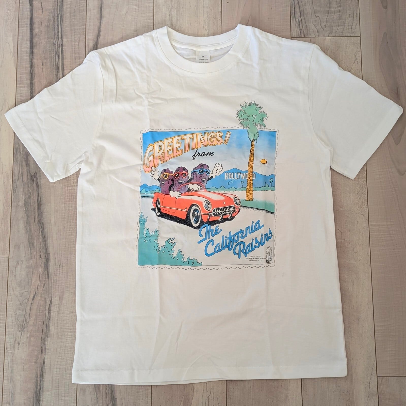 【 California Raisins( カリフォルニアレーズン )】『 GREETINGS! from Hollywood 』/ Tシャツ〚アメリカン雑貨 アメトイ〛