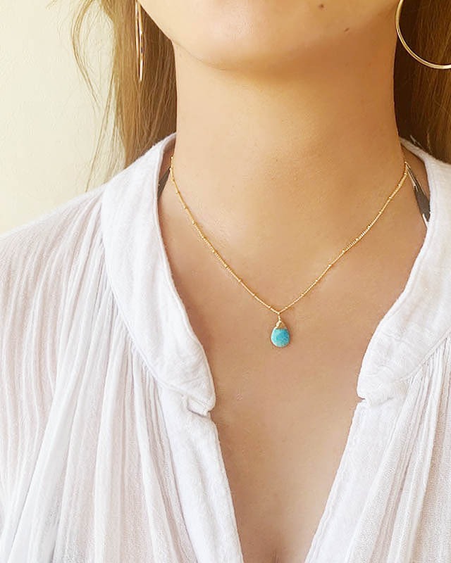 Turquoise necklace /  on the beach