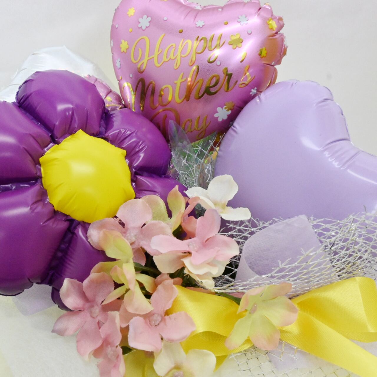 3 600 イベント パープルのお花で元気で笑顔に バルーンギフト になりん