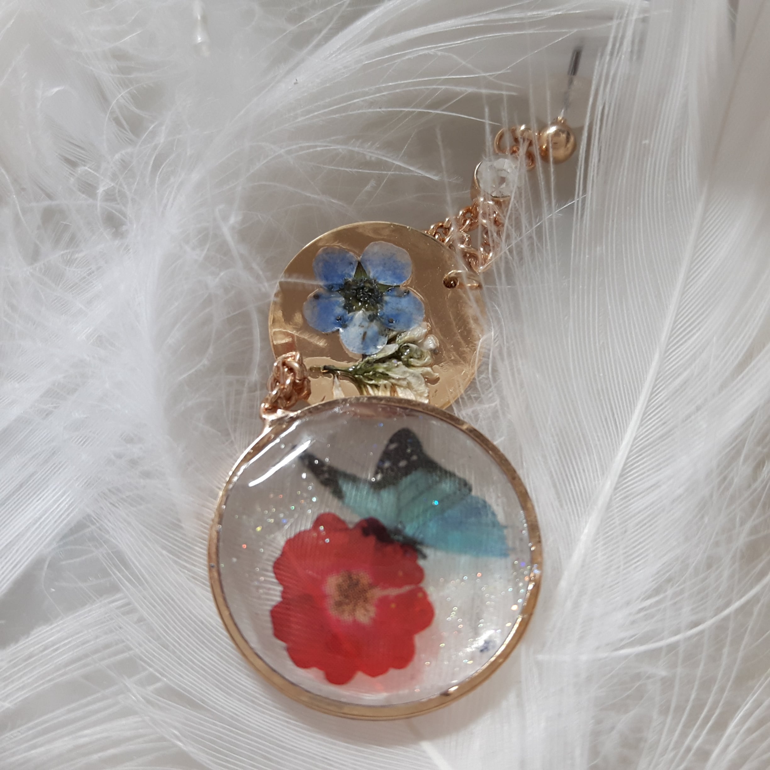 押し花とuvレジンのピアス Flos