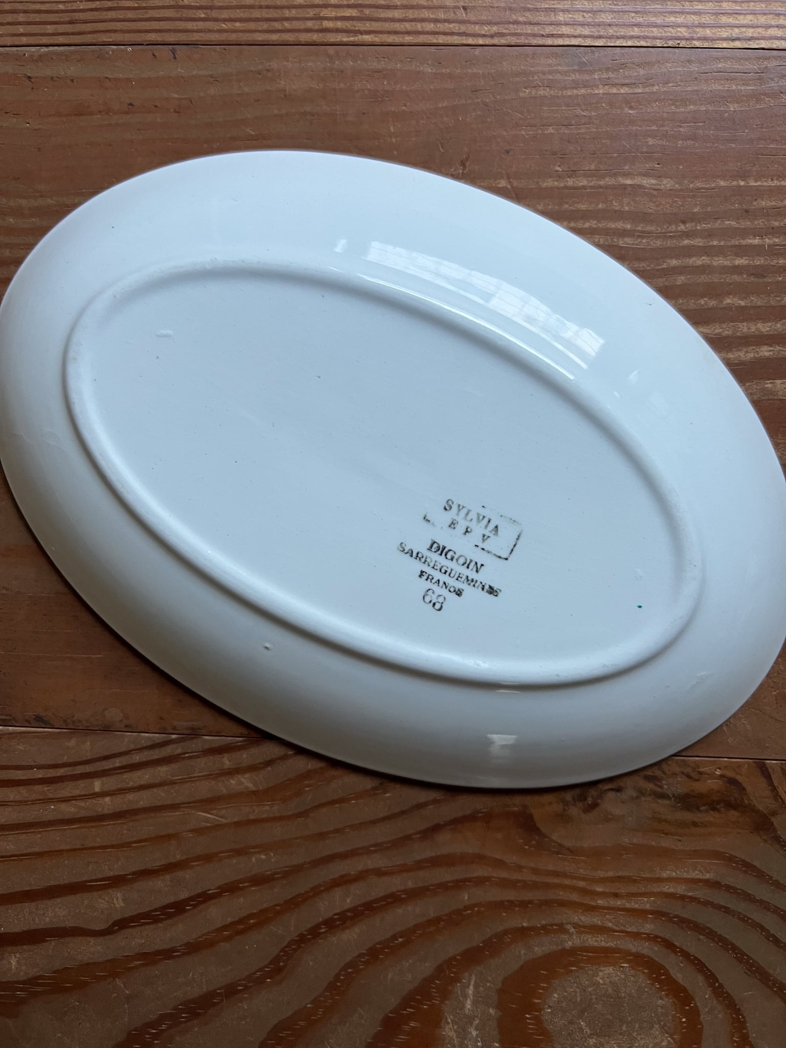 グリーンの小花がかわいい小さめのオーバルプレート サルグミンヌ・ディゴワン フレンチアンティーク