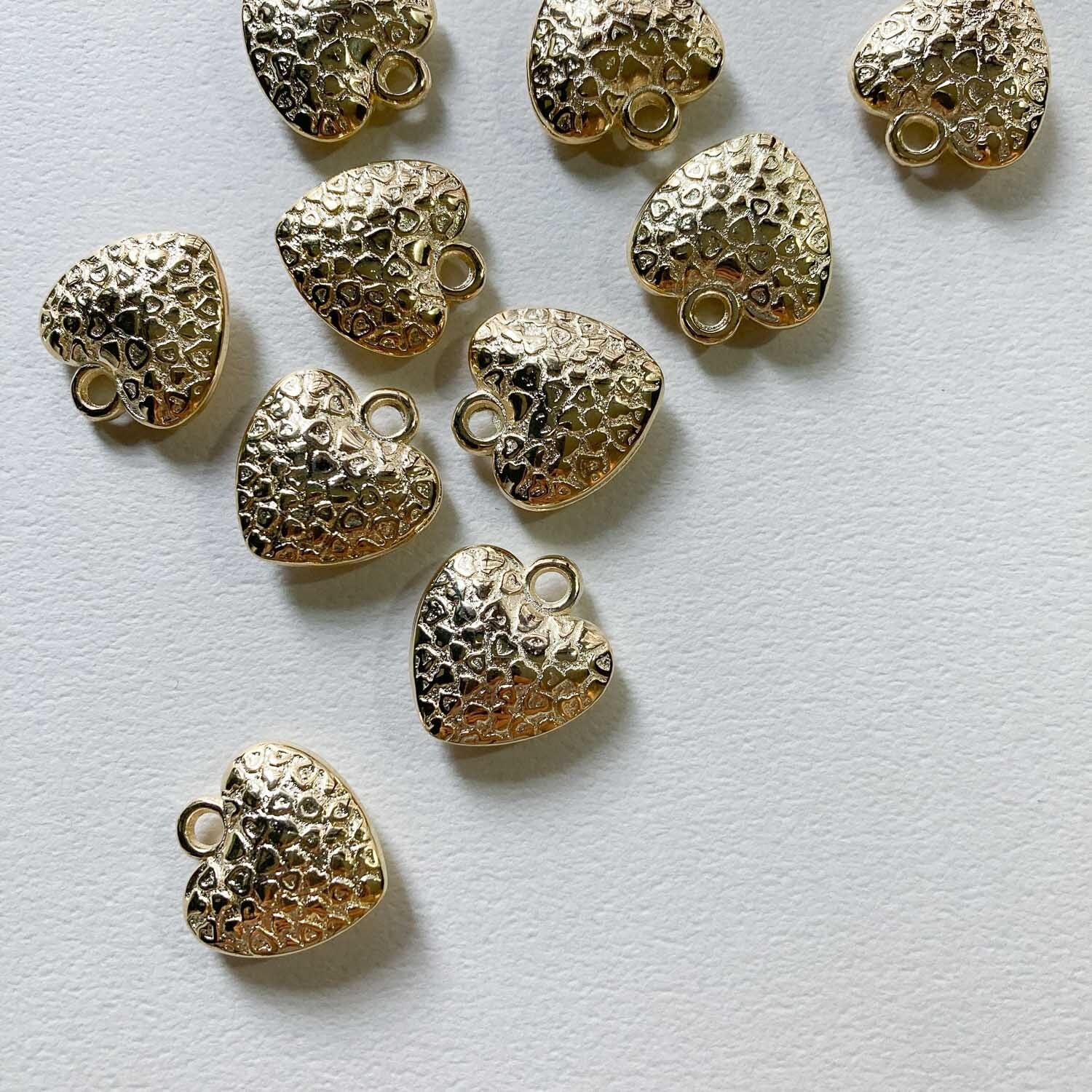 再入荷〉ハート模様ハートチャームS（19mm/ゴールド） | Dua
