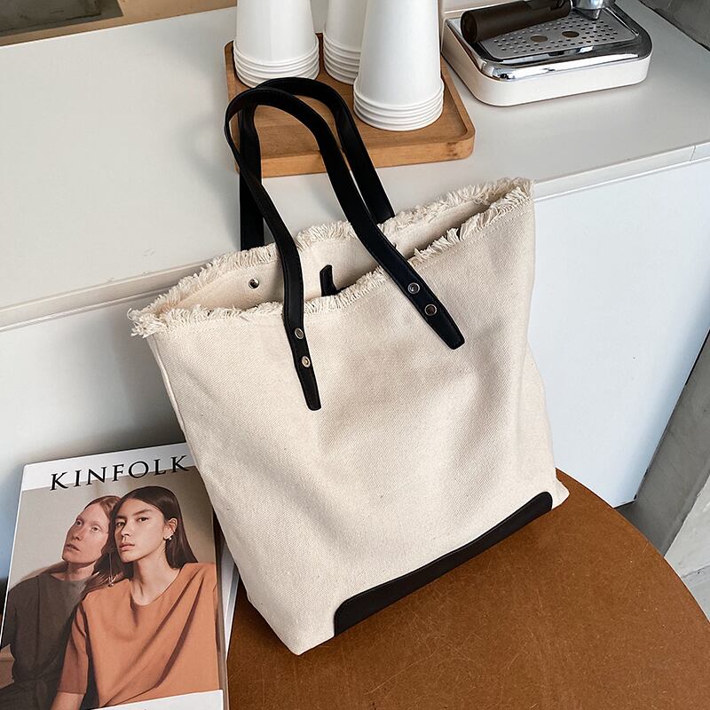 シンプルな女性の大きなバッグ女性2020新しい流行のファッション大容量キャンバスショルダーバッグネットレッドワイルドトートバッグ Tiancai_Wing_Bag38155238449