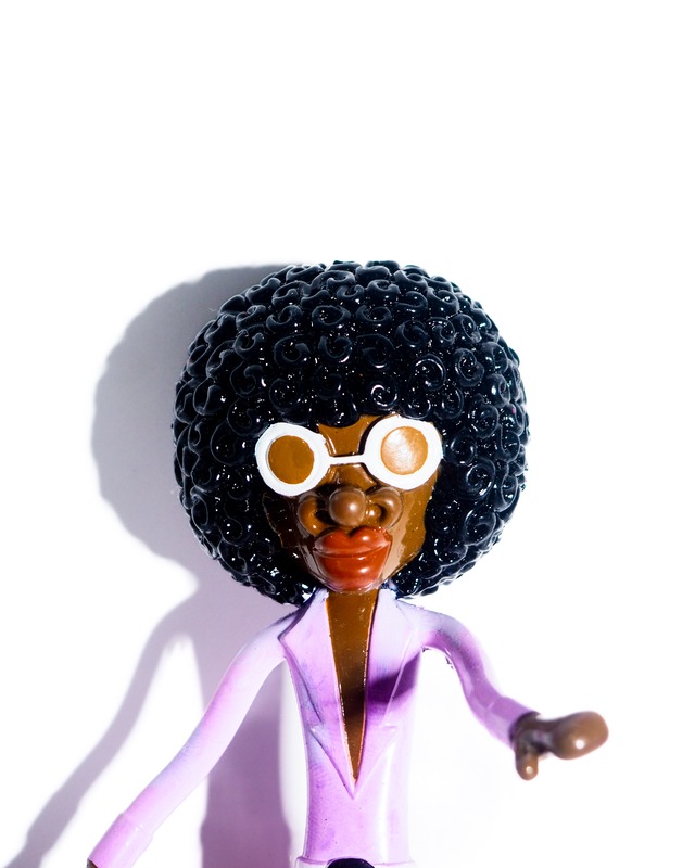 Wiggly Afro-Haired Doll Toy
