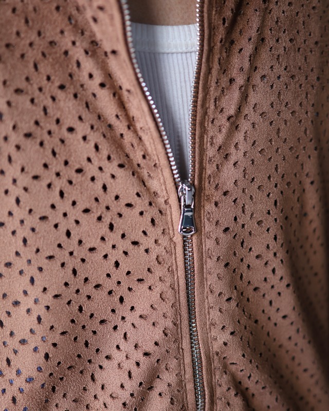 Laser cut mesh blouson