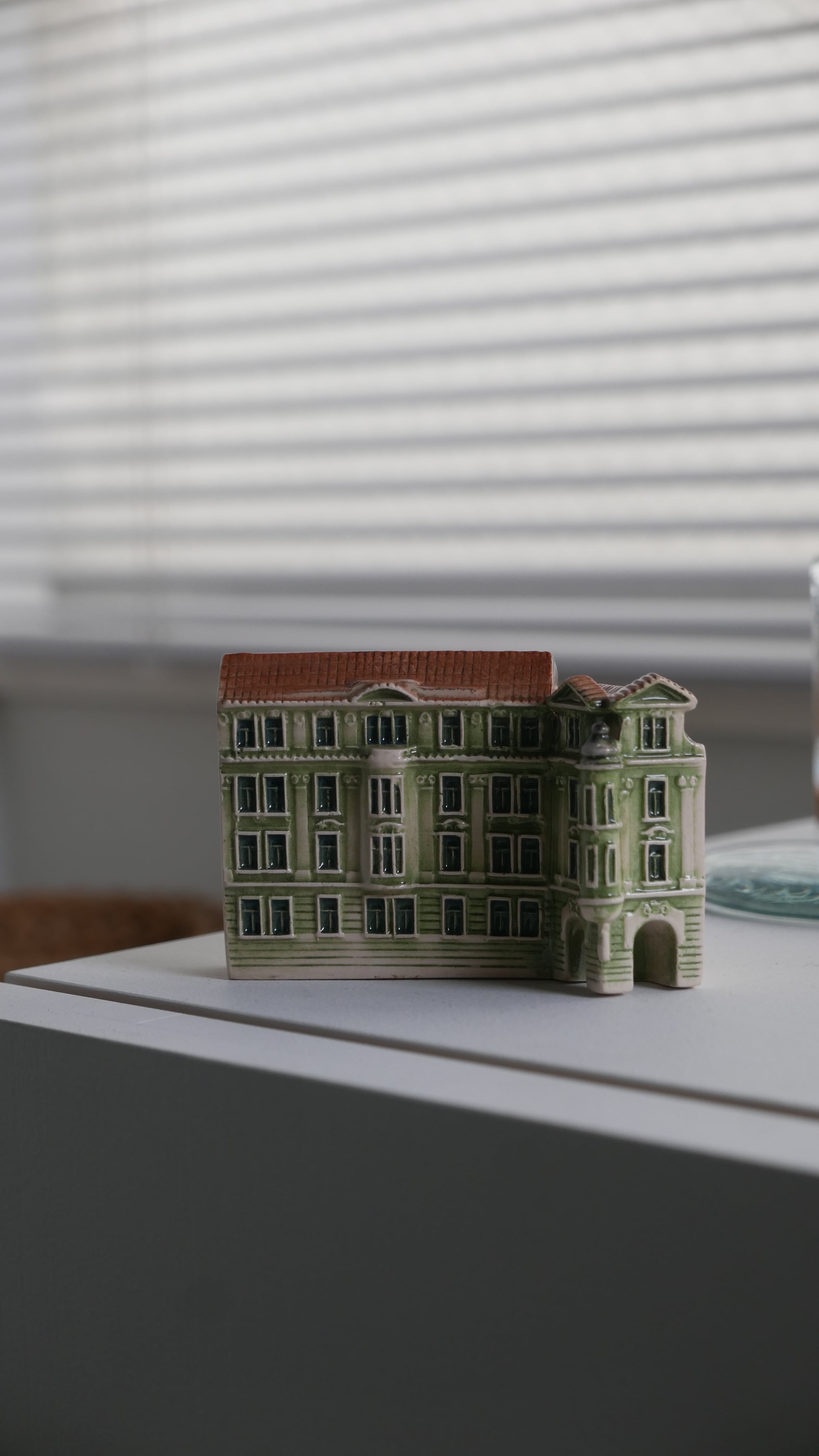 old miniature building , brown × light green