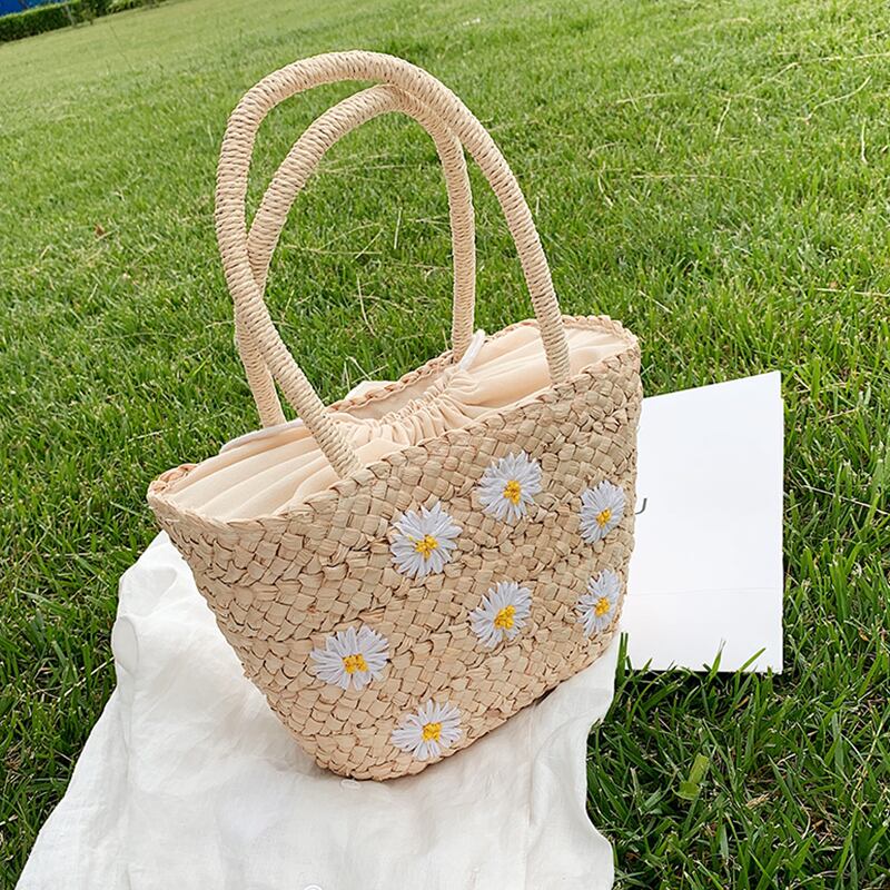 夏の大きなバッグ女性バッグ2020新しい流行のファッションネット赤いデイジーストローショルダーバッグワイルドバケットバッグ Tiancai_Wing_Bag2220764
