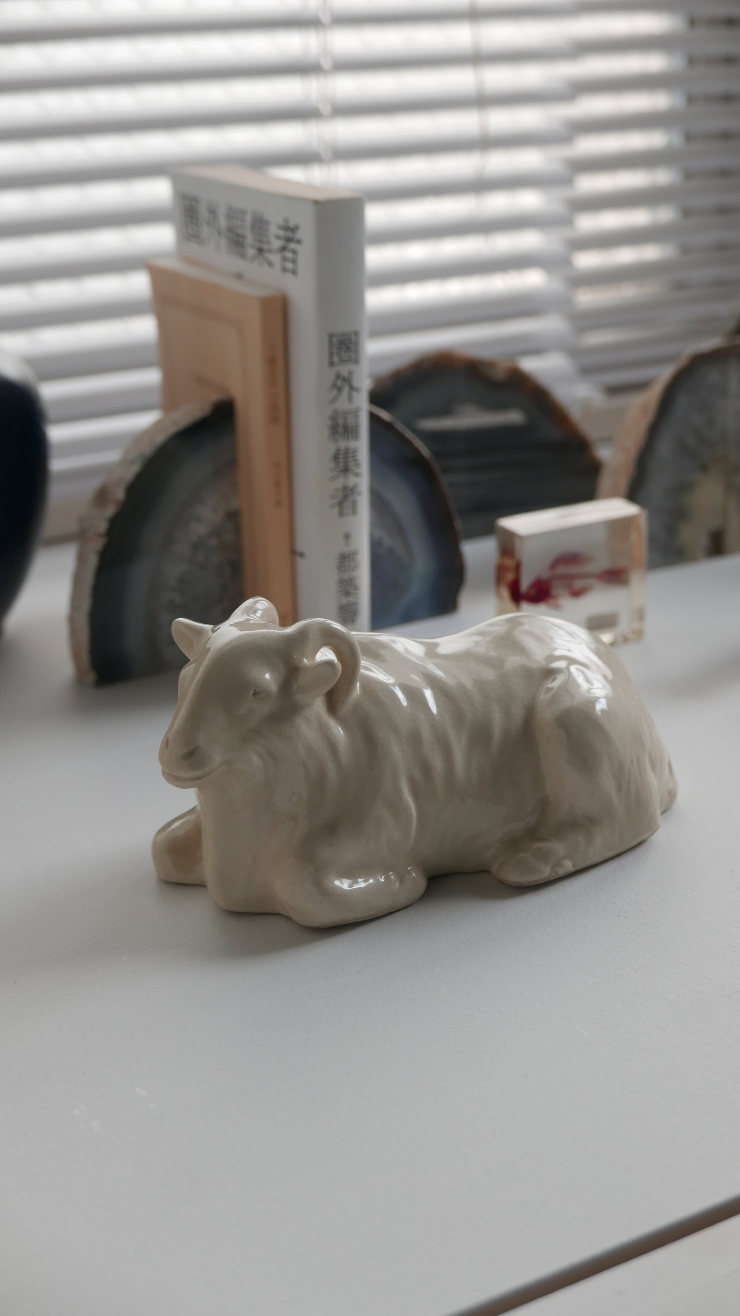 pottery sheep , dusty white