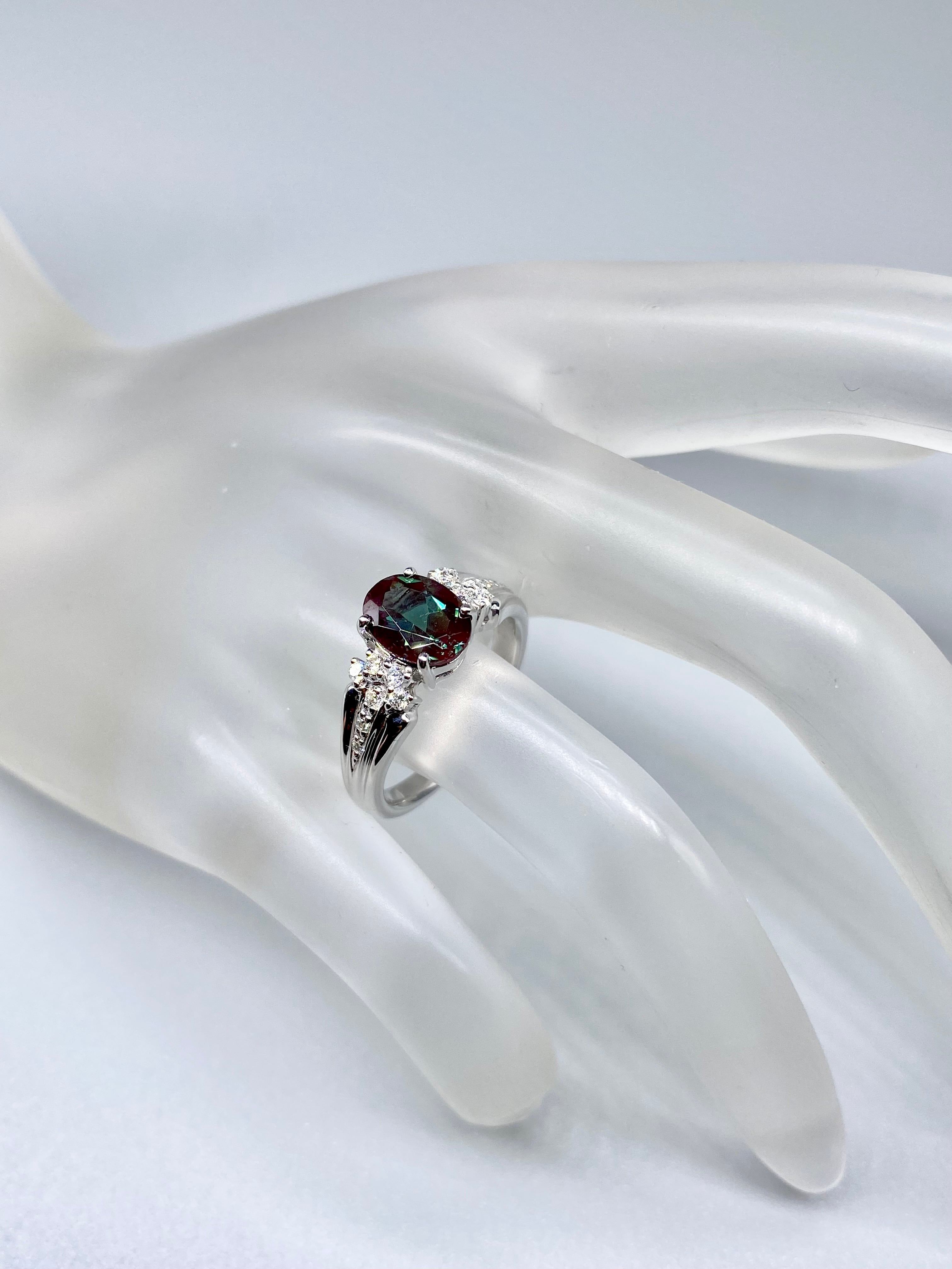 カラーチェンジアンデシン 1.066ct / ダイヤモンド 計0.13ct K18WG
