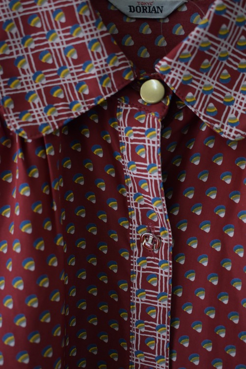 Red patterned retro blouse