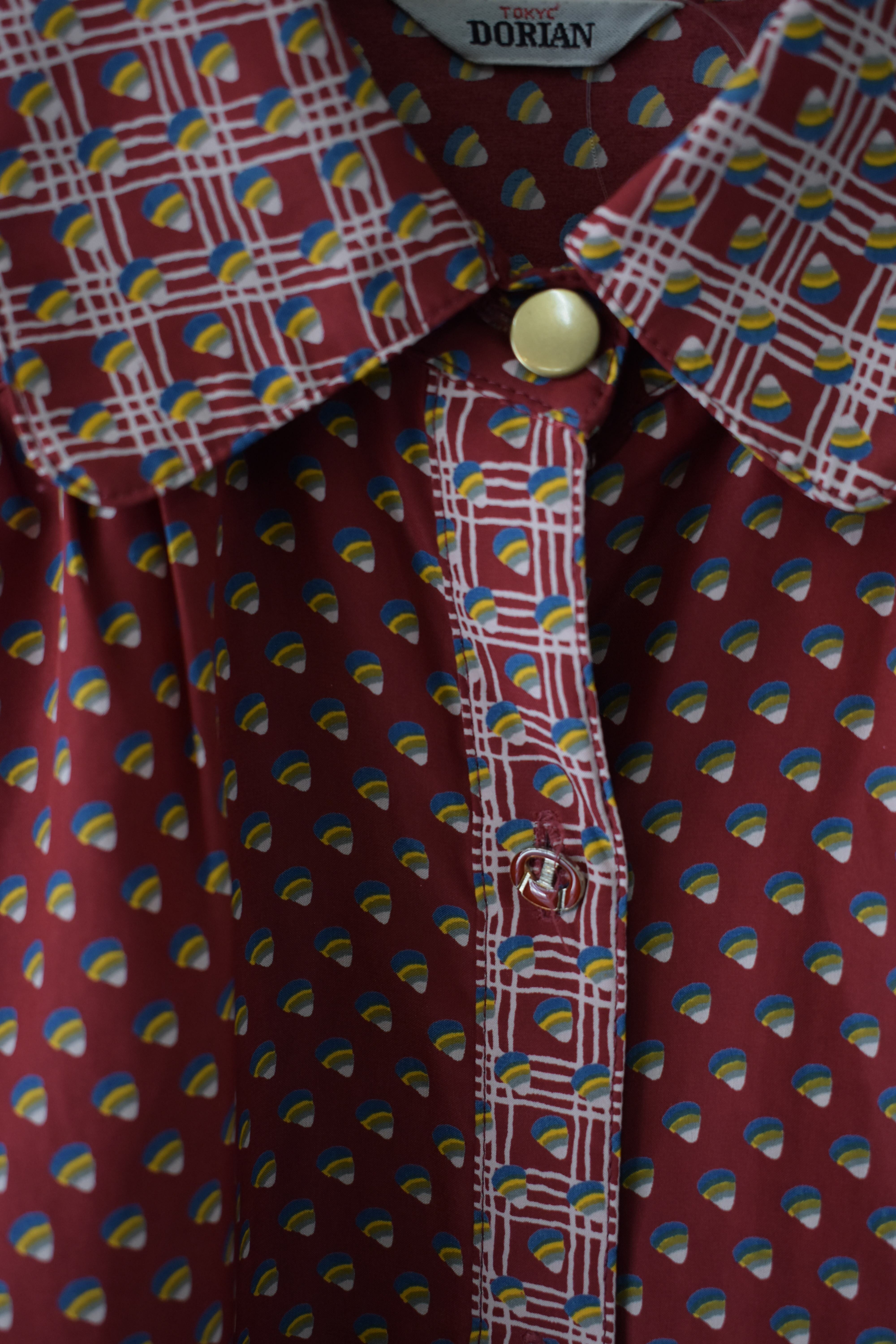 Red patterned retro blouse