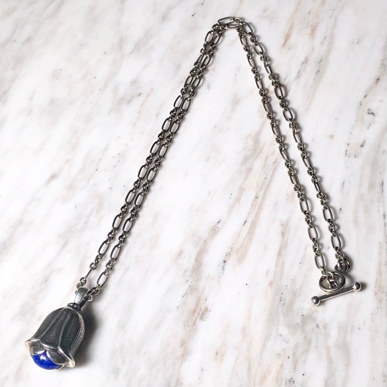 2007's GEORG JENSEN silver year pendant set with lapis lazuli