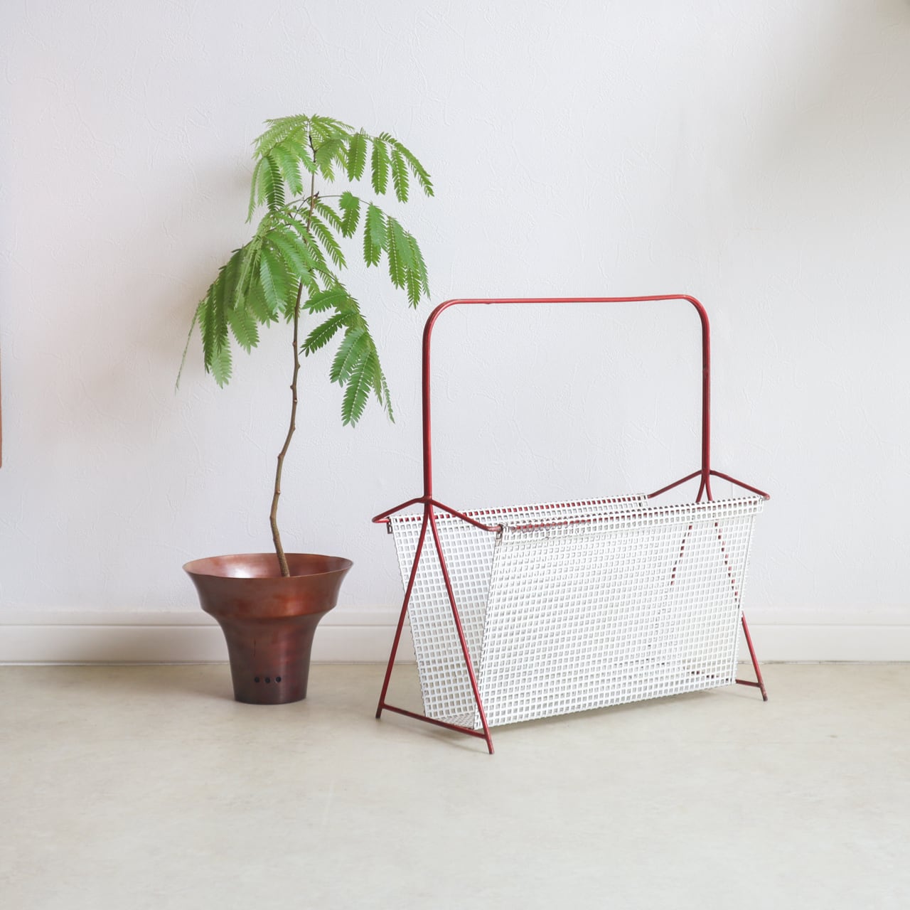 PUNCHING METAL MAGAZINE RACK | 1950-60s | Netherlands