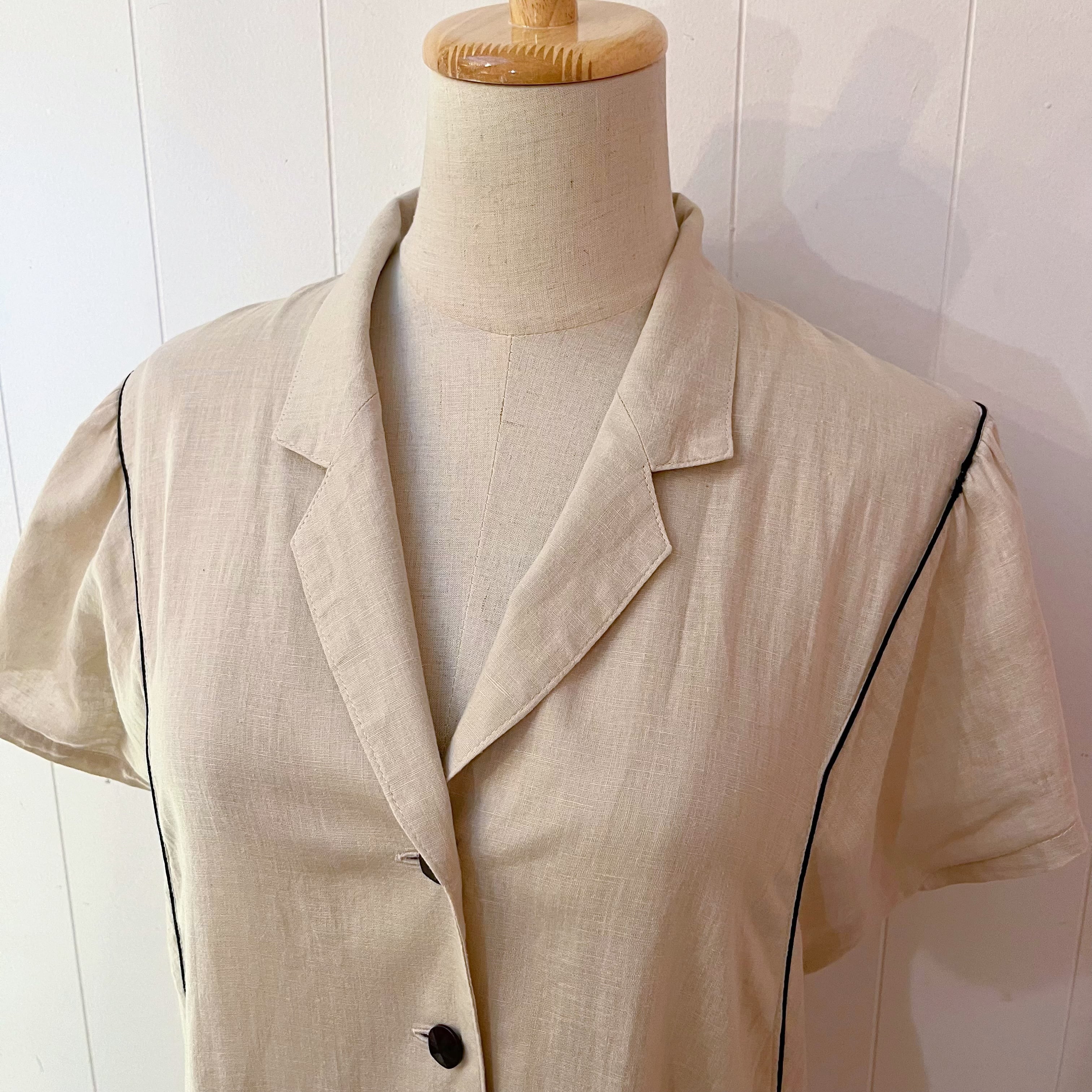 beige open collar one-piece