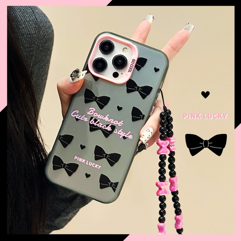【iPhone16シリーズ対応】ブラックリボン×ピンクが大人可愛い◎韓国ケース カメラ保護フレーム ストラップ 黒 蝶々結び スマホケース ND-15746