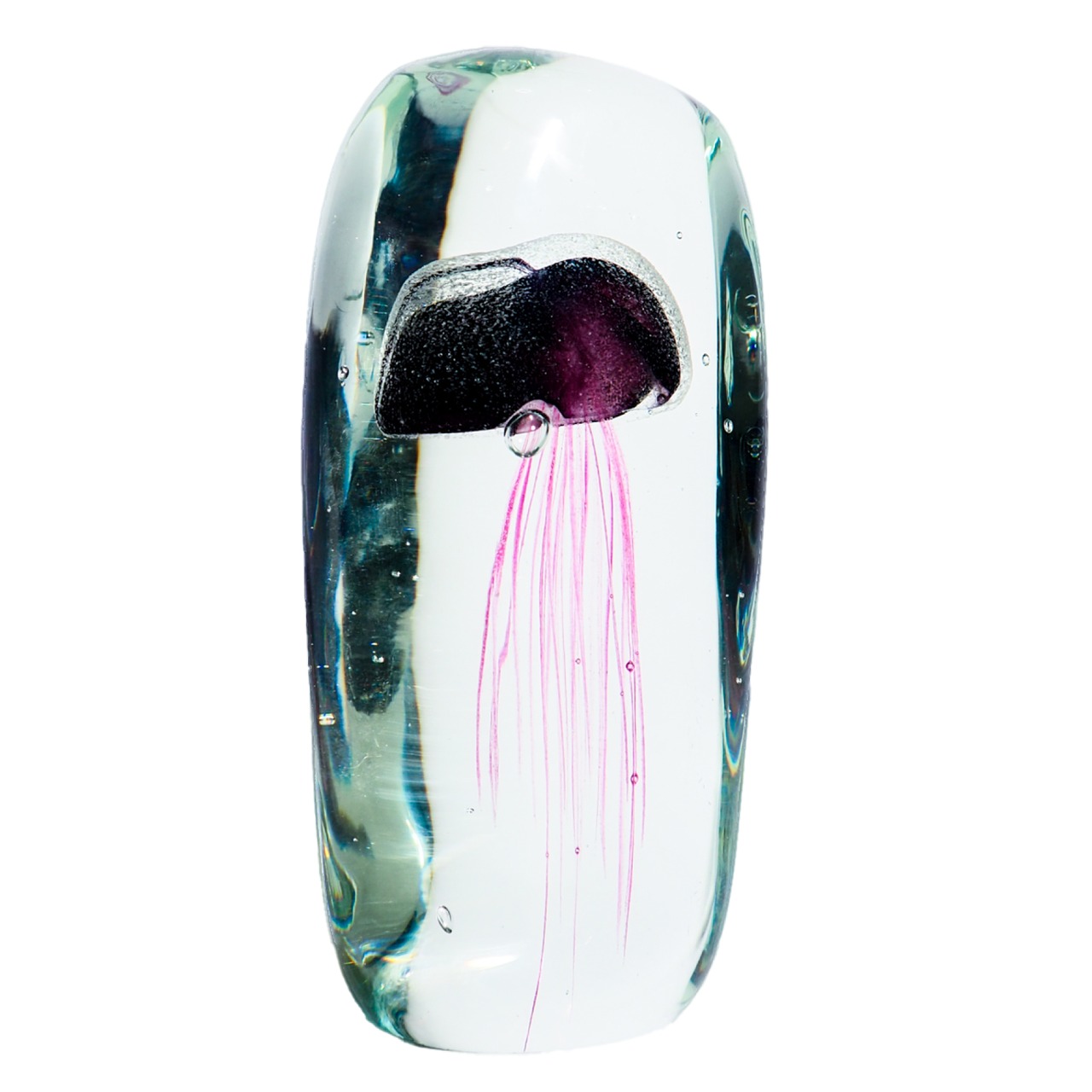 A paperweight object containing a glass jellyfish