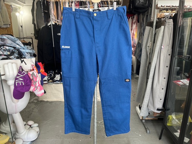 X-LARGE × DICKIES WORK PANT BLUE 36 94676