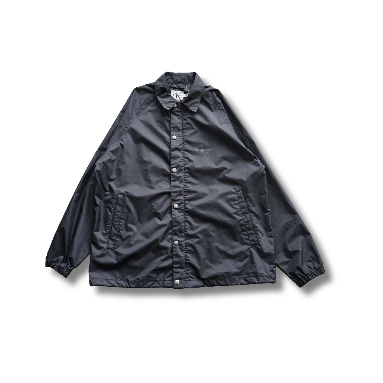Calvin Klein Jeans CK ロゴ ナイロン コーチジャケット ブラック(表記M・実寸L相当)|NA953
