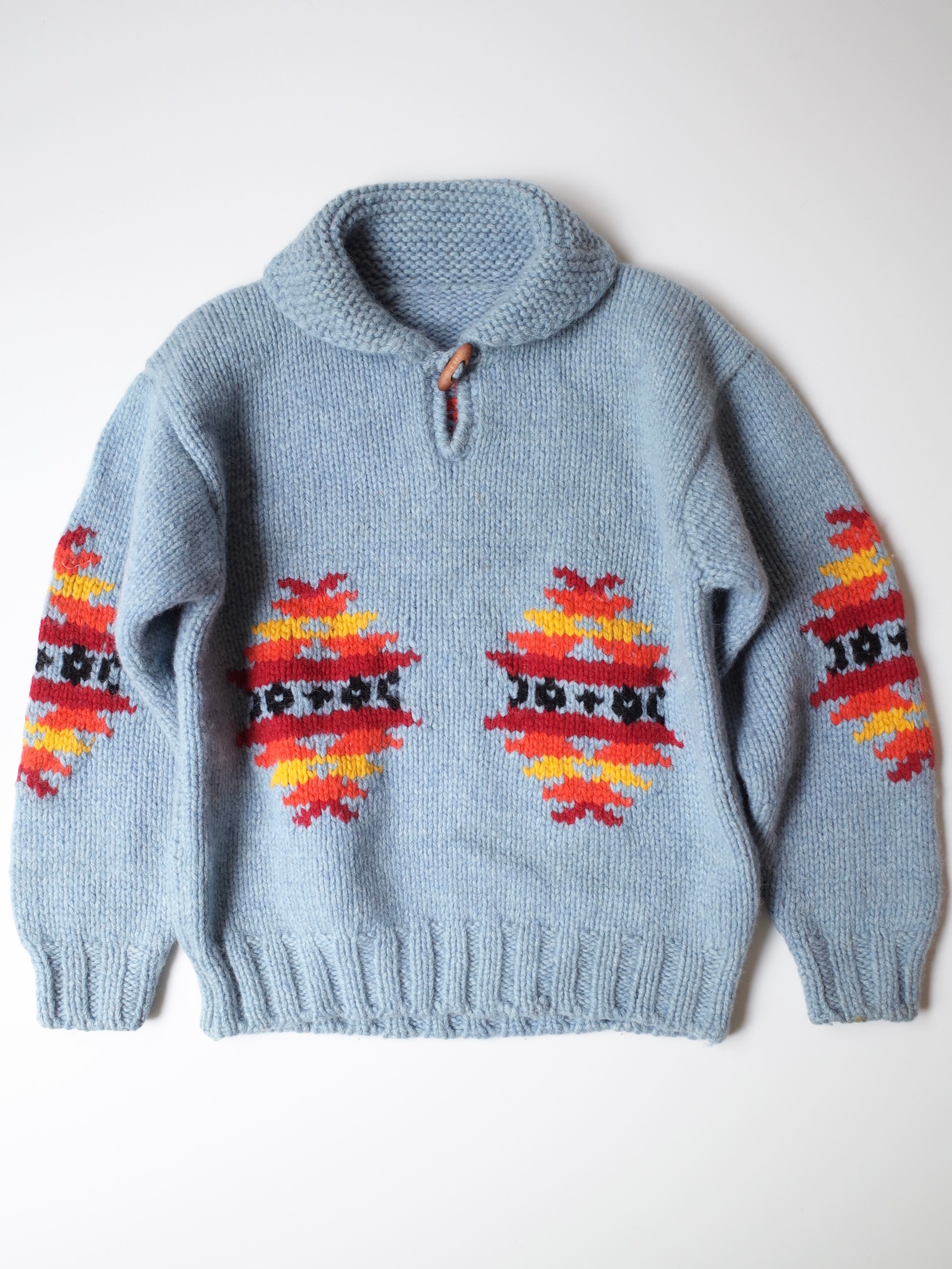 Native design low gauge knit sweater