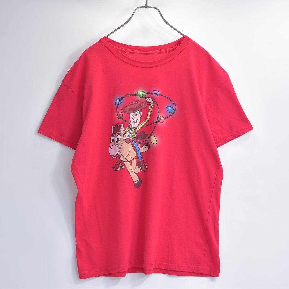 ヴィンテージ 古着　キッズ トイ・ストーリー Tシャツ 赤 PIXAR ピクサー トイストーリー ウッディ ブルズアイ 電飾 クリスマス