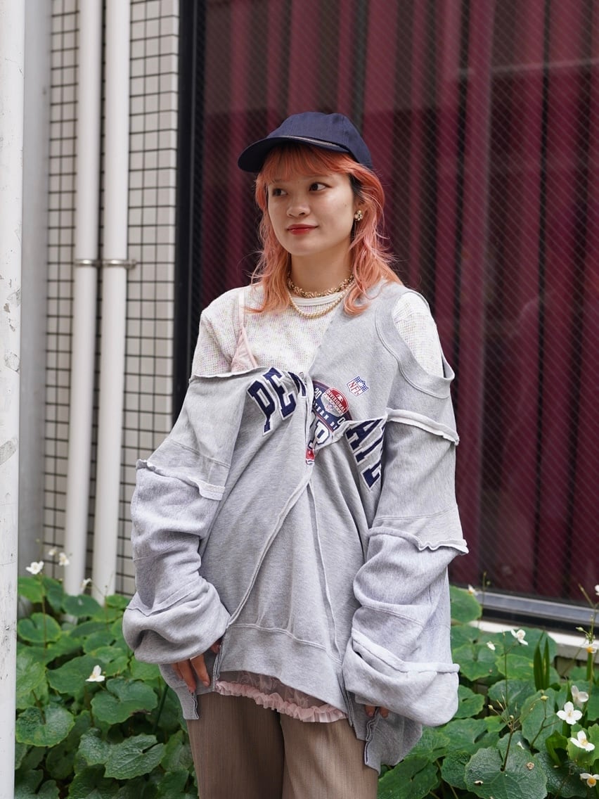 77circa (77サーカ) “circa make cross cutback wide print sweat top”