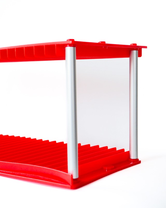 Plastic CD rack holding 20 discs