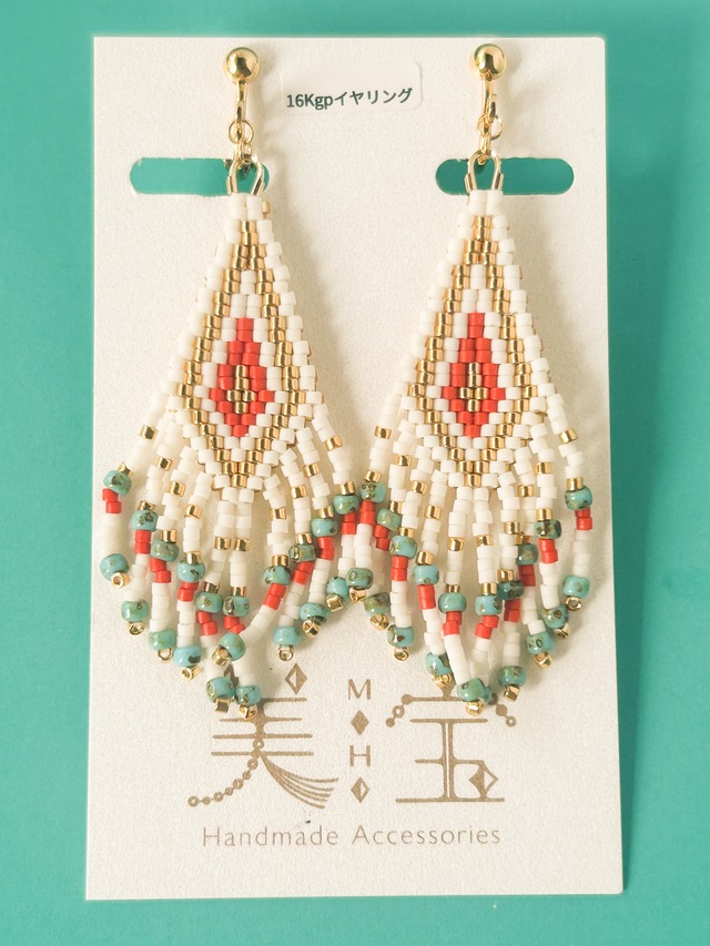 　オレンジのフリンジイヤリング　