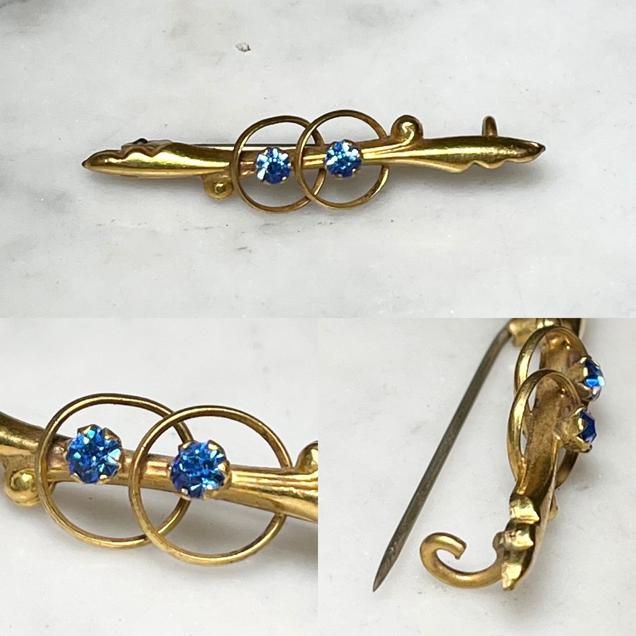 antique metal feather motif brooch