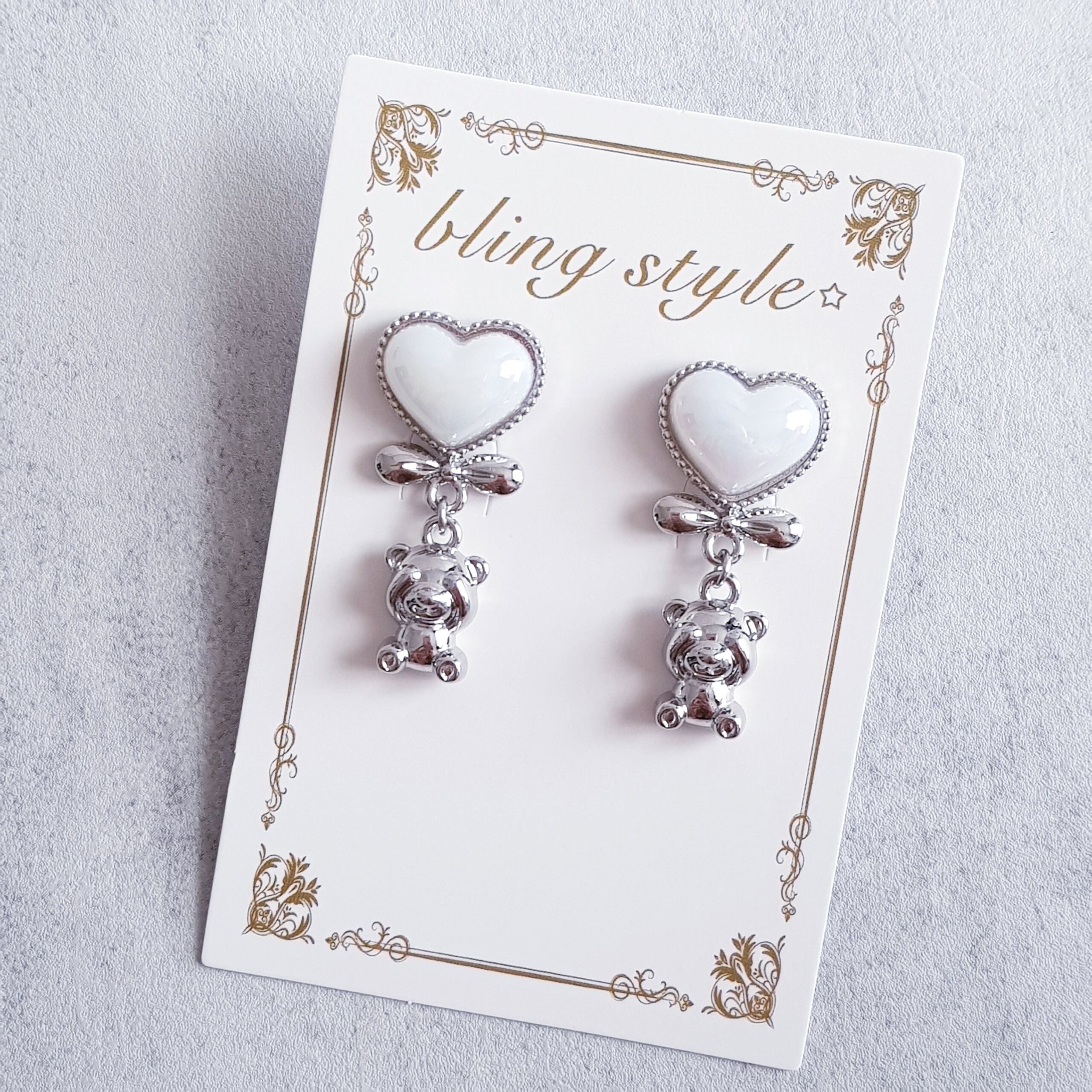 オーロラピンクリボンとパールとハートのビジューピアス/イヤリング