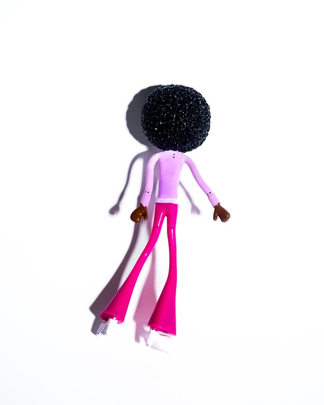 Wiggly Afro-Haired Doll Toy
