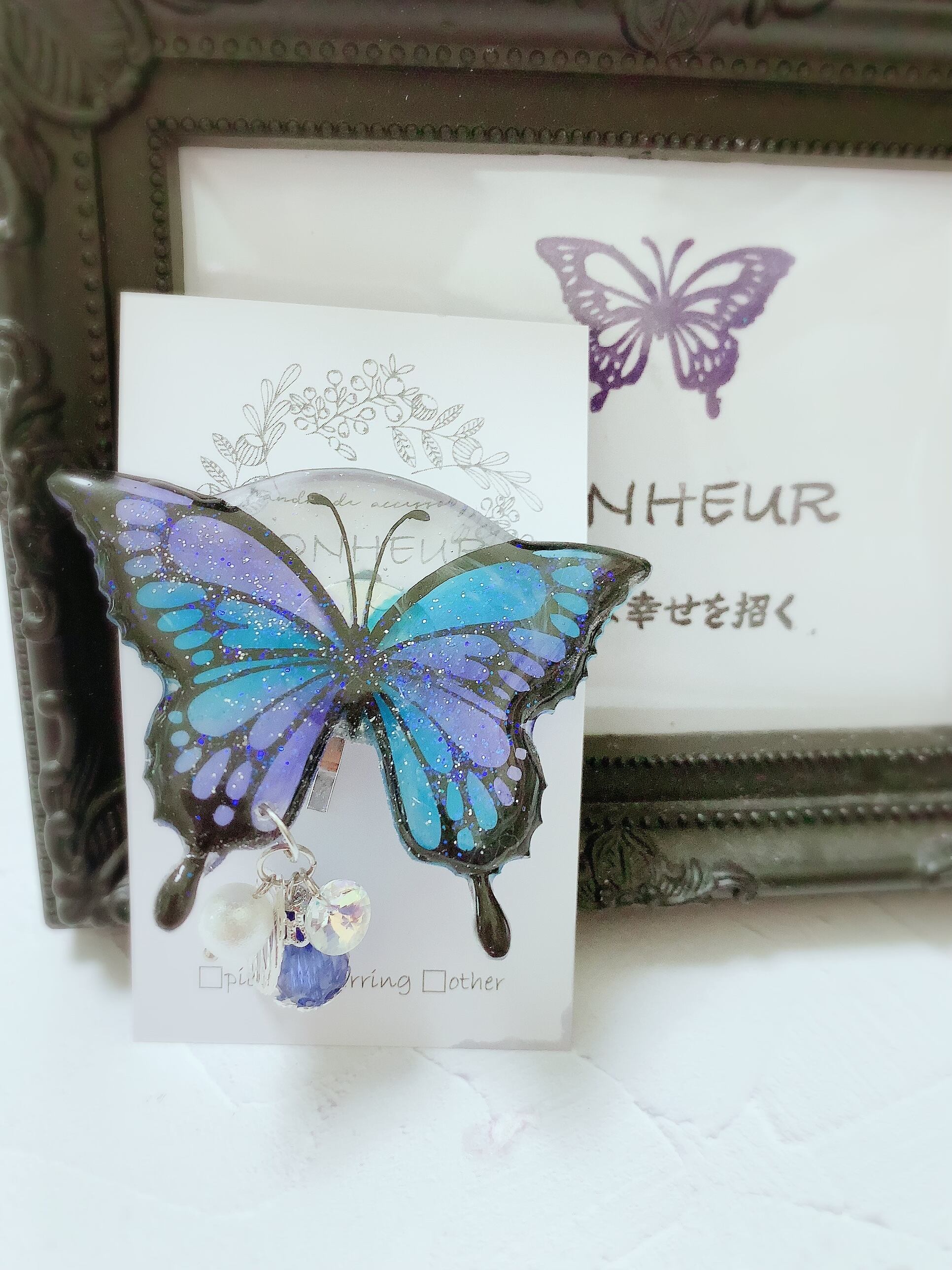 幸せを招く紫の蝶のポニーフック | BONHEUR