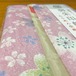 ちりめん生地を使った桜柄のスピーチバルーン御朱印帳包み：御朱印帳カバー　ちりめんシリーズ　賑い桜　桜　さくら