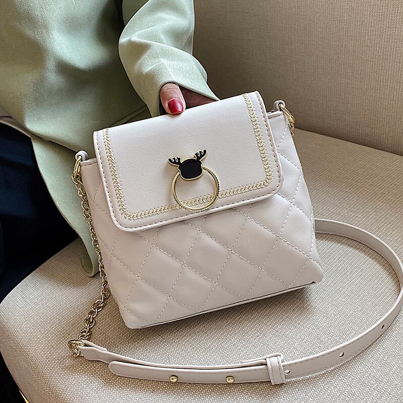 ネットレッドレディーバッグ2020ニューウェーブサマーワイルドダイヤモンドチェーンクロスボディバッグファッション大容量バケットバッグ Tiancai_Wing_Bag4418811