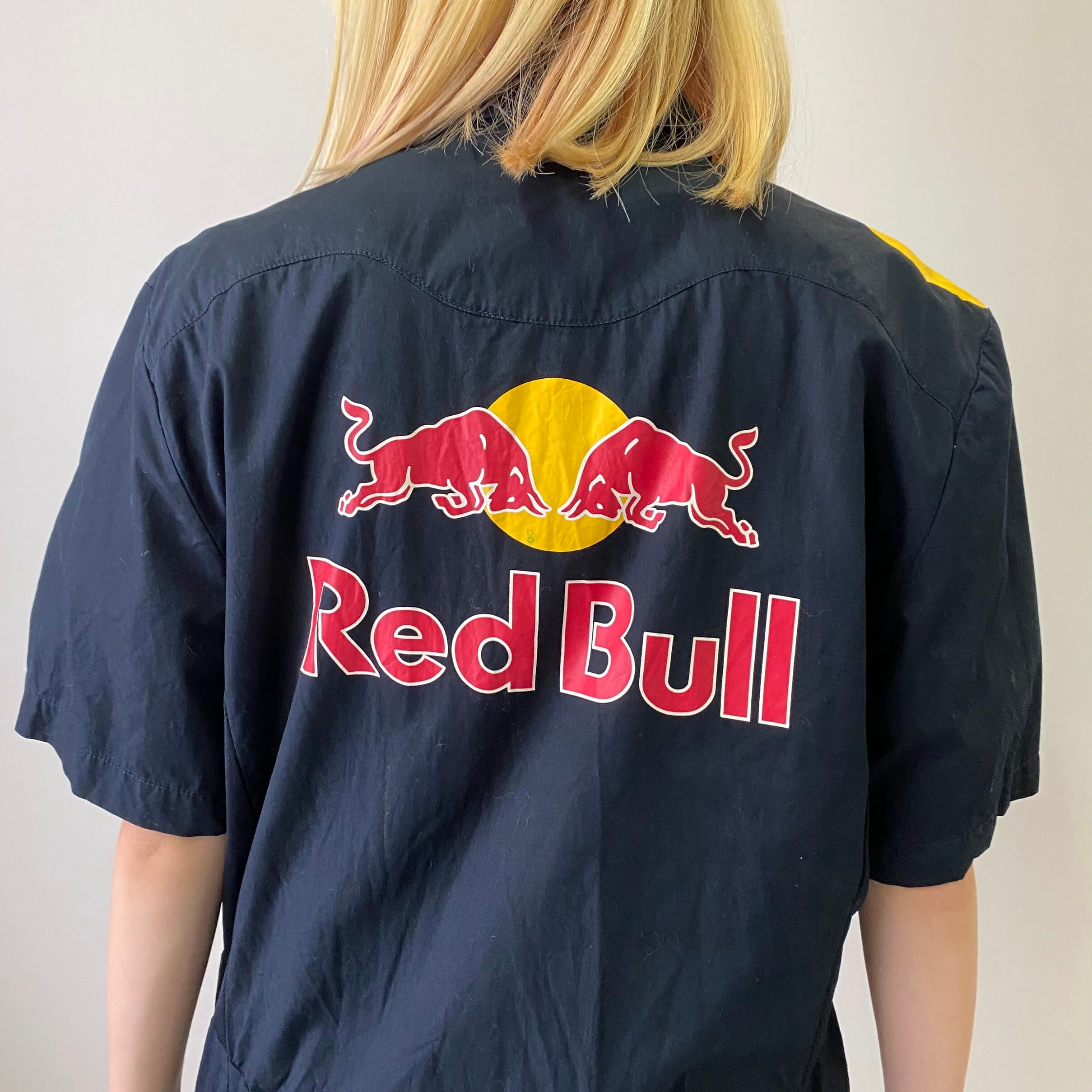 Puma プーマ Red Bull レッドブル 企業ロゴ 刺 バックプリント 半袖ワークシャツ メンズm 古着 ブラック 黒 半袖シャツ Ss27 50b Cave 古着屋 公式 古着通販サイト