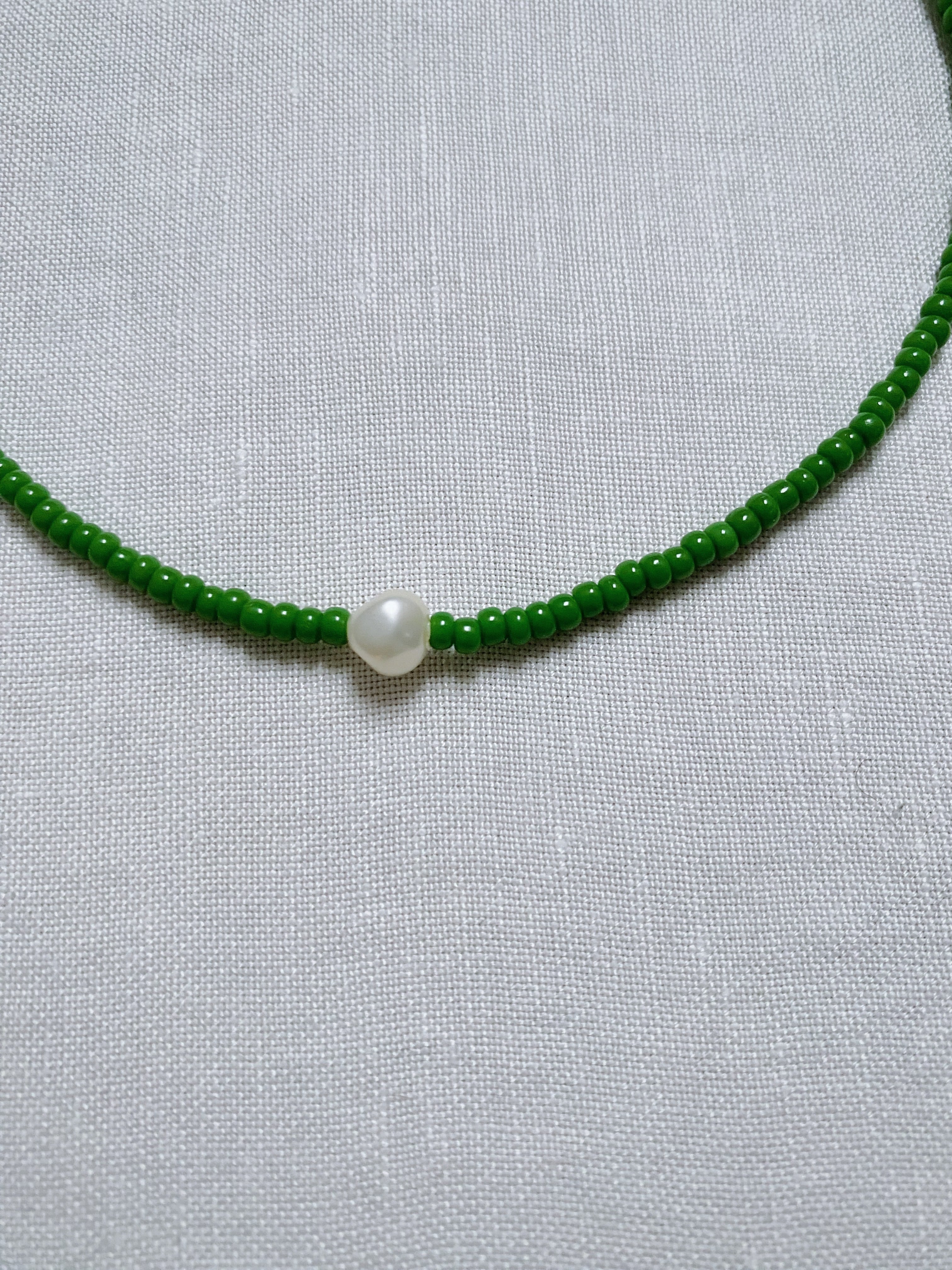 green seed glass necklace
