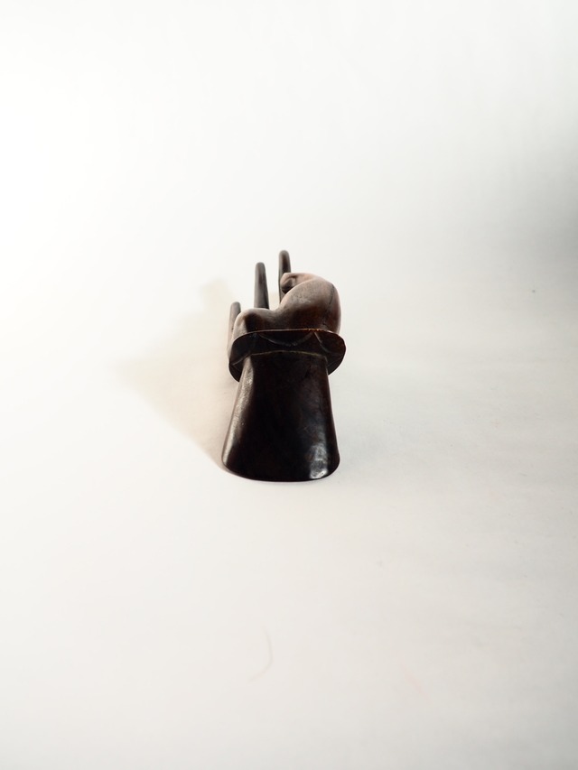 Wood carving big female hand