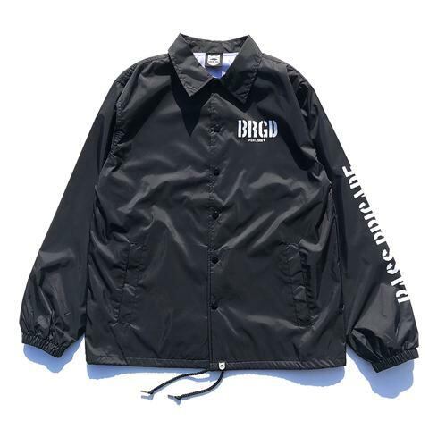 スケルトンシールドロゴ コーチジャケット ブラック/ホワイト