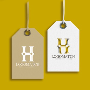 堅牢なラグジュアリーHのロゴ