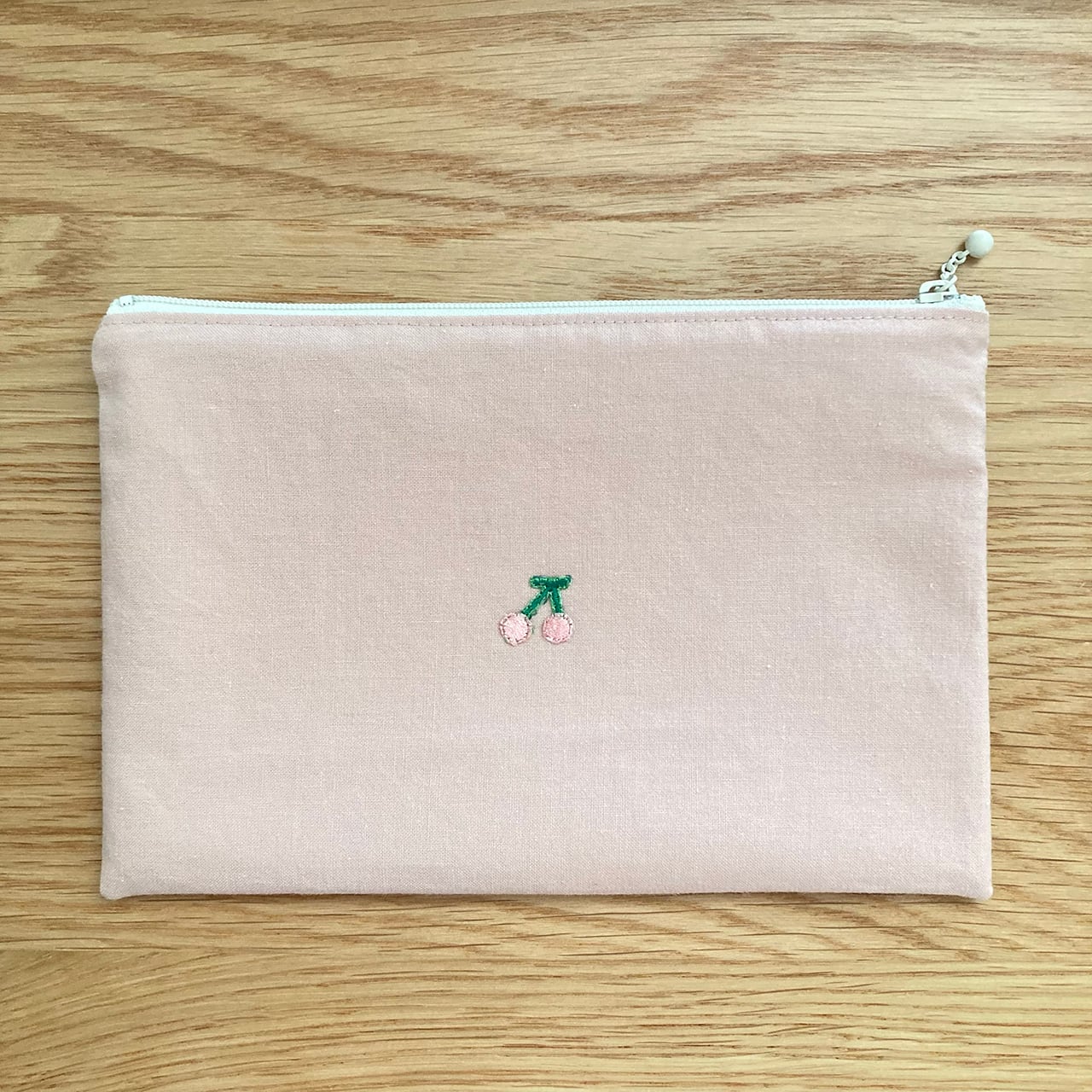 フラットポーチむくみちゃん（ピンク）