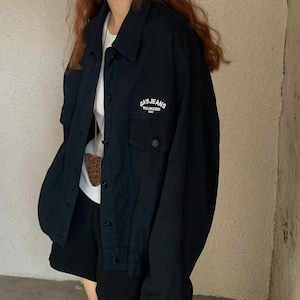 embroidered logo over jacket J00019
