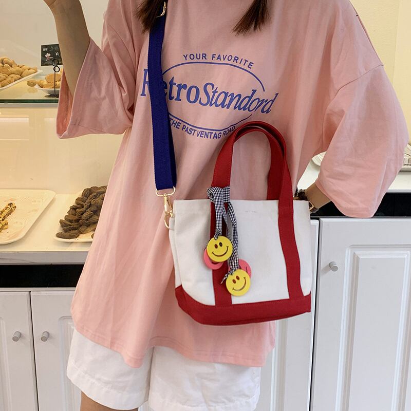 夏の女性の小さなバッグ2020新しいトレンディな野生のキャンバスシングルショルダーメッセンジャーバッグネット赤ポータブルバケットバッグ Tiancai_Wing_Bag4558897