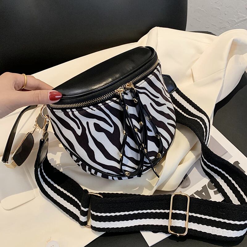 ゼブラパターンバッグ女性2020新しい流行のファッションネットレッドワイドショルダーストラップメッセンジャーバッグワイルドインシングルショルダーサドルバッグ Tiancai_Wing_Bag57904348229