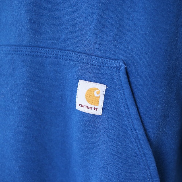 "Carhartt" sleeve logo printed over silhouette blue sweat parka