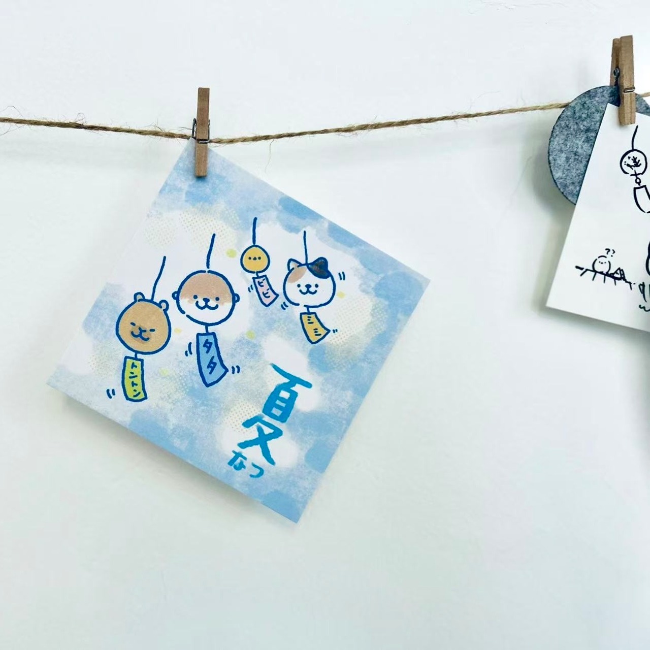 夏の風鈴カワウソファミリポストカード