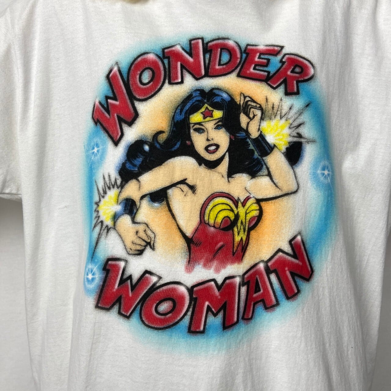 WONDER WOMAN ワンダーウーマン アート キャラクタープリント リンガーTシャツ メンズXL 古着 ホワイト 白 スプレーアート アメコミ  映画 ムービー【Tシャツ】 | cave 古着屋【公式】古着通販サイト