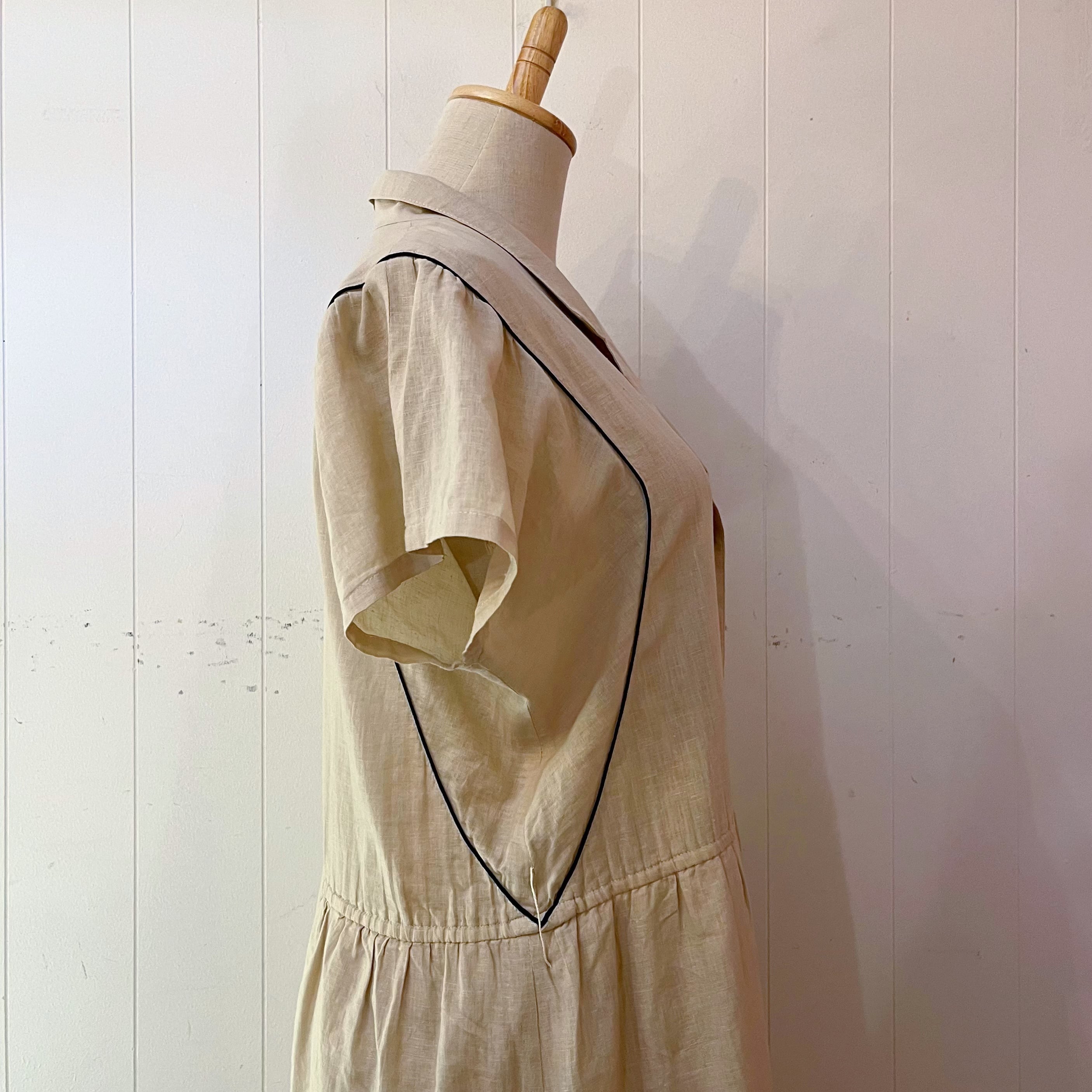 beige open collar one-piece